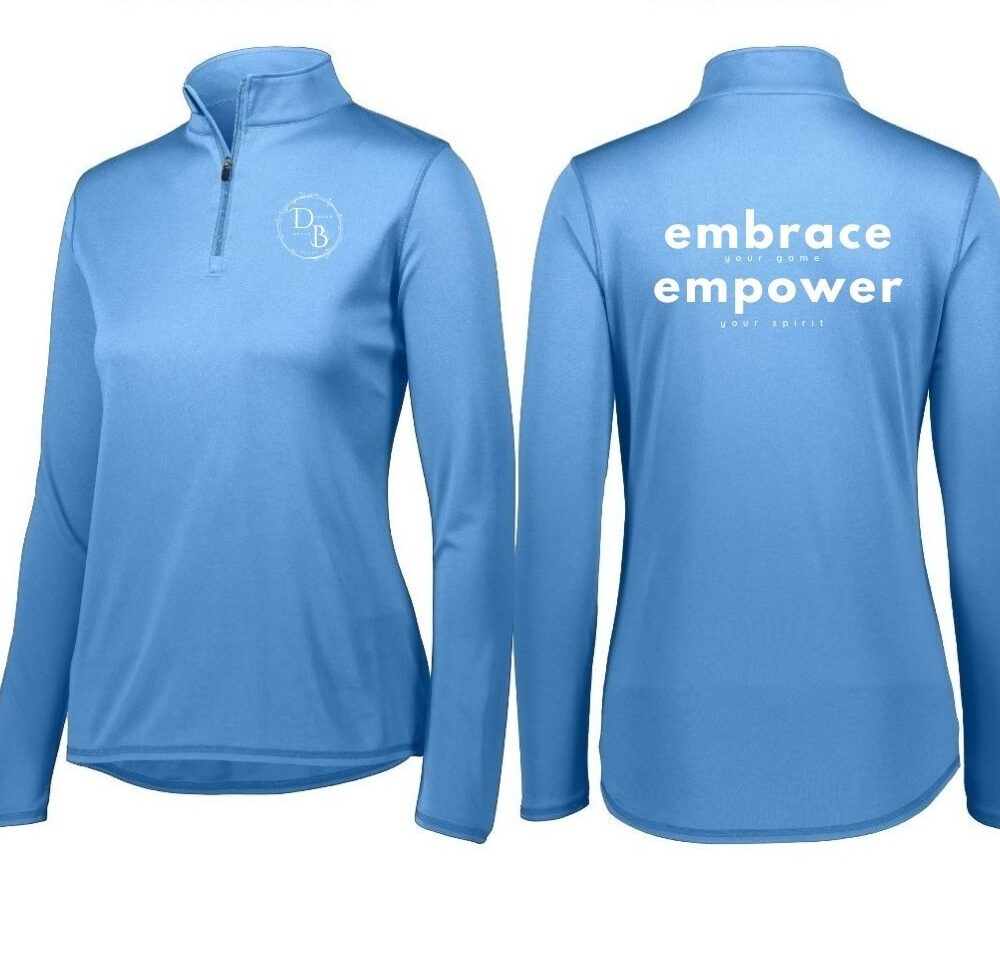 Blue long-sleeve top with empowering back text.