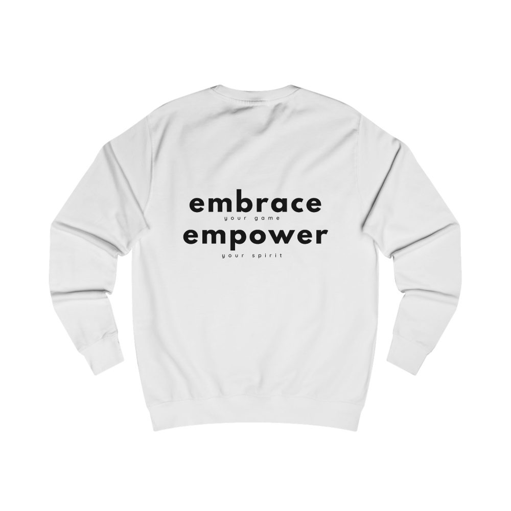 White sweatshirt with 'embrace empower' text design.