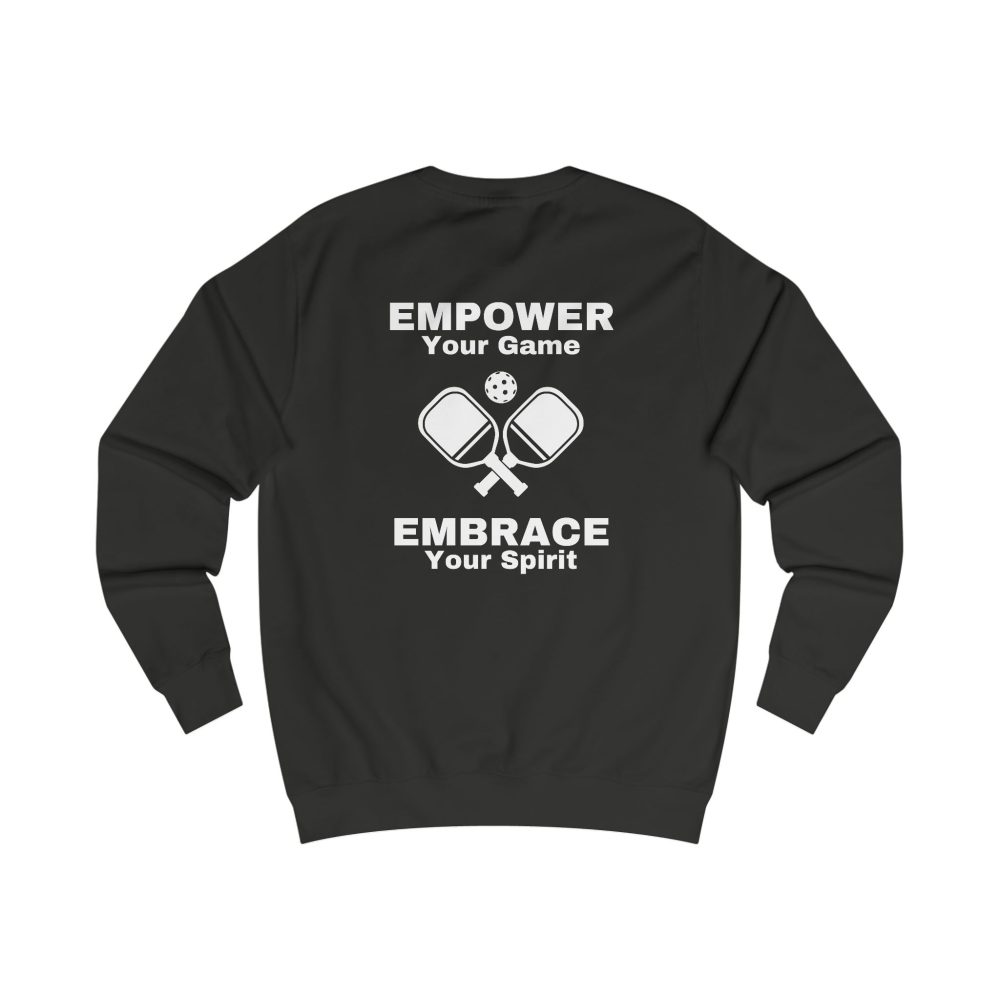 Black sweater with pickleball-themed design and text.