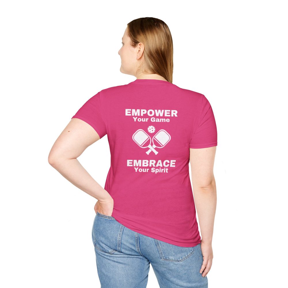 Woman in pink t-shirt with motivational message.