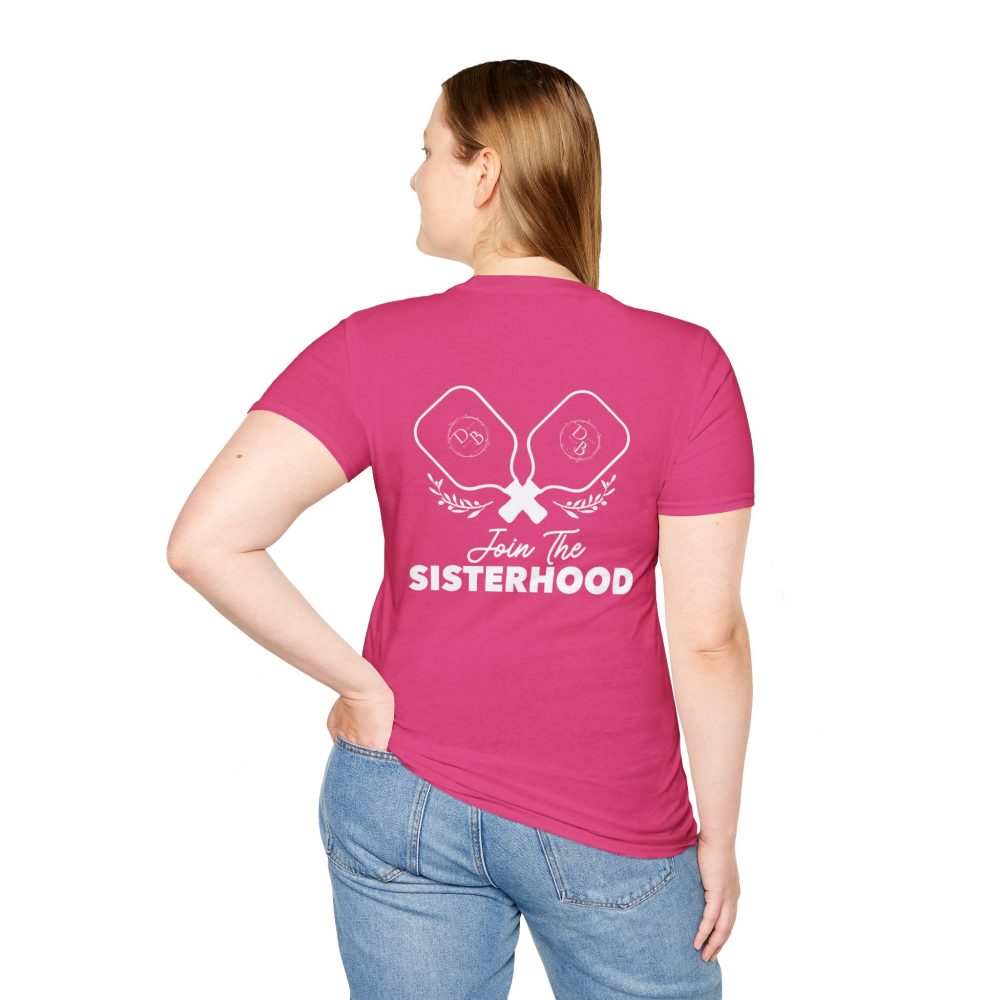 Woman wearing pink 'Join the Sisterhood' T-shirt