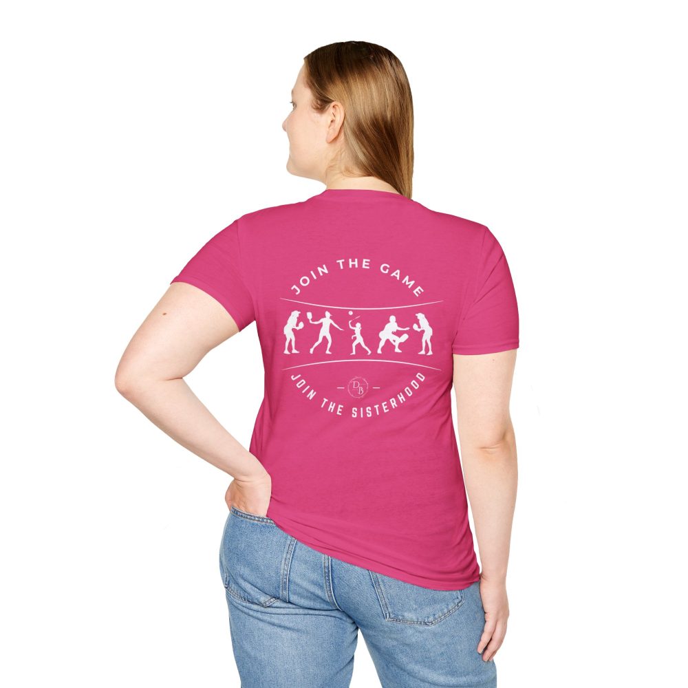 Woman wears pink sports-themed sisterhood T-shirt.