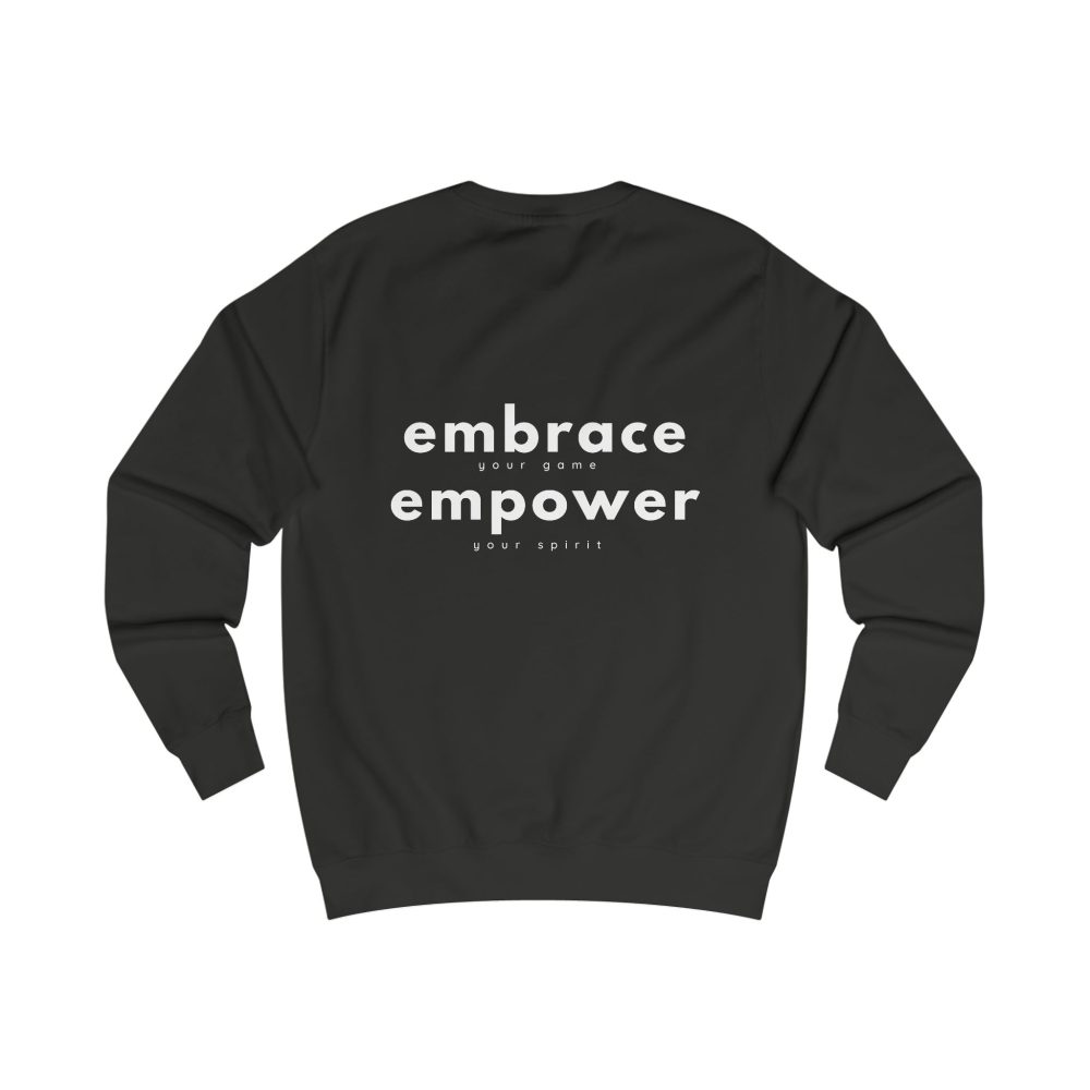 Black sweatshirt with embrace, empower text on back.